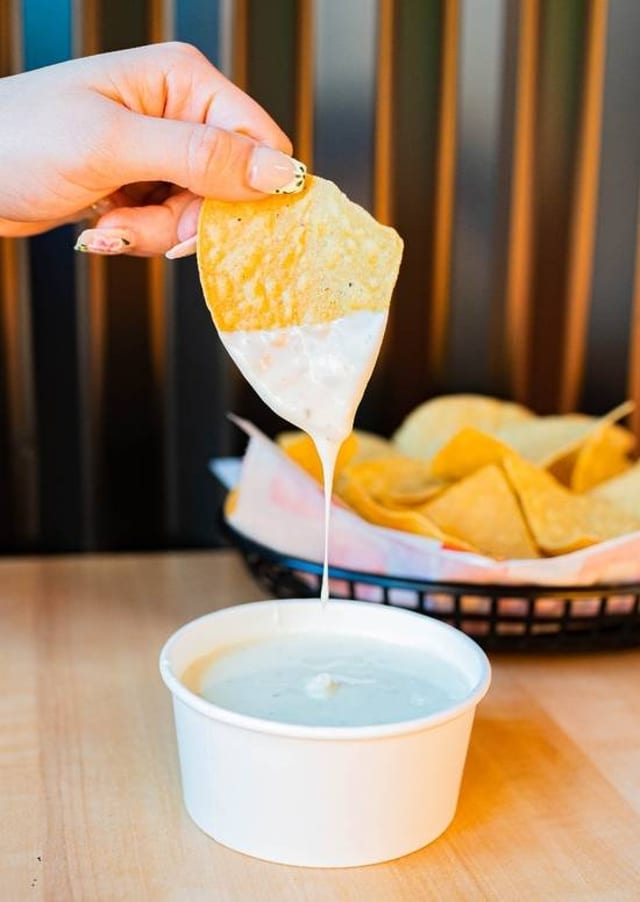 Small queso dip 2oz&chips.